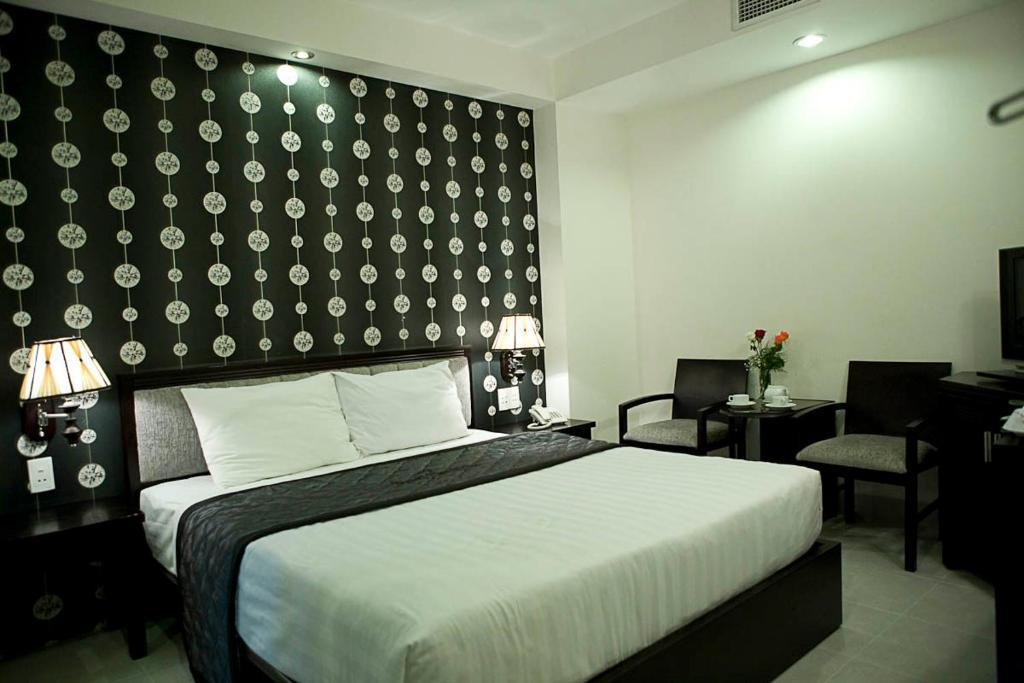 Hoang Vinh Hotel Cidade de Ho Chi Minh Quarto foto