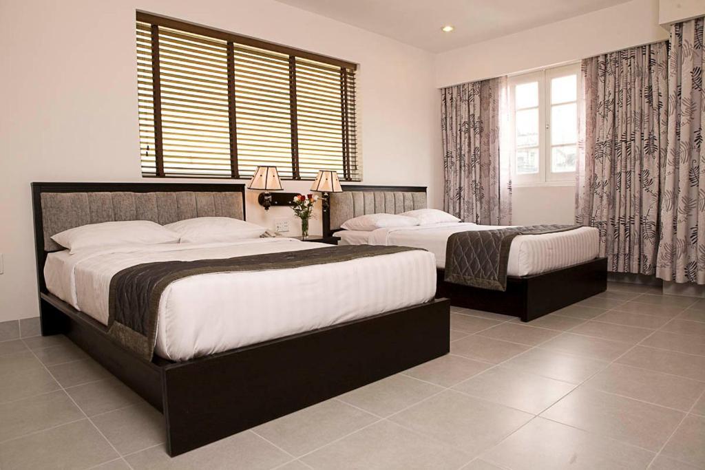 Hoang Vinh Hotel Cidade de Ho Chi Minh Quarto foto